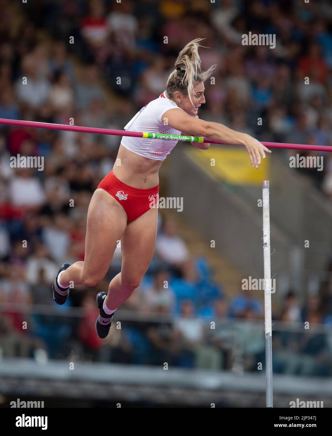Molly Caudery of England competing in the women's pole vault final at