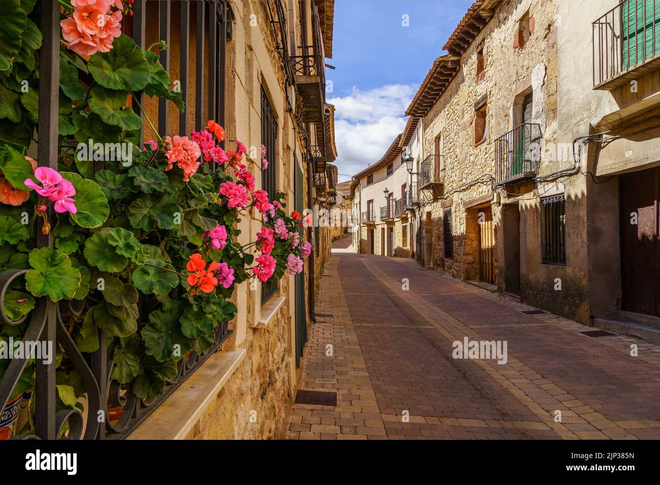 Medieval old town with stone houses, old doors and windows, cobbled streets and picturesque atmosphere. Atienza, Guadalajara, Spain. Europe. Stock Photo