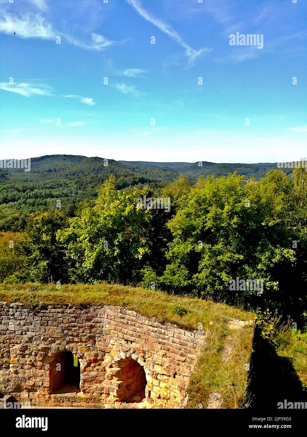 A vertical shot of Grafenstein castle in green mountains in Merzalben, Germany Stock Photo