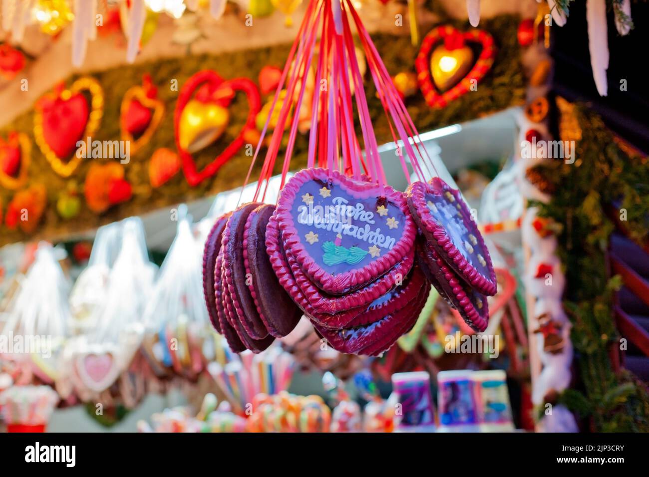 Heart-Shaped Gingerbread Cookies or Lebkuchen stall at Christmas market Striezelmarkt in Dresden, Saxony, Germany Stock Photo