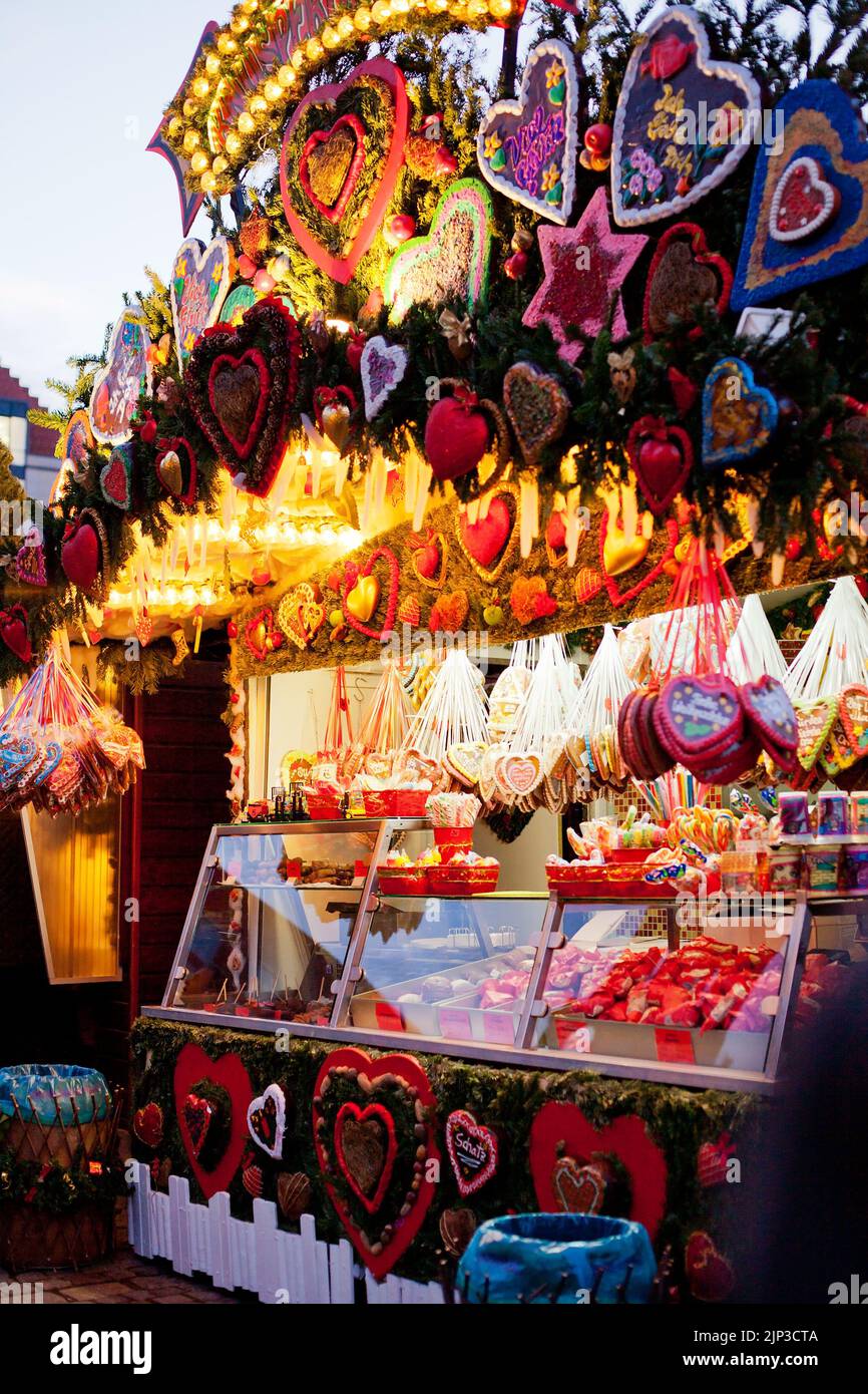 Heart-Shaped Gingerbread Cookies or Lebkuchen stall at Christmas market Striezelmarkt in Dresden, Saxony, Germany Stock Photo