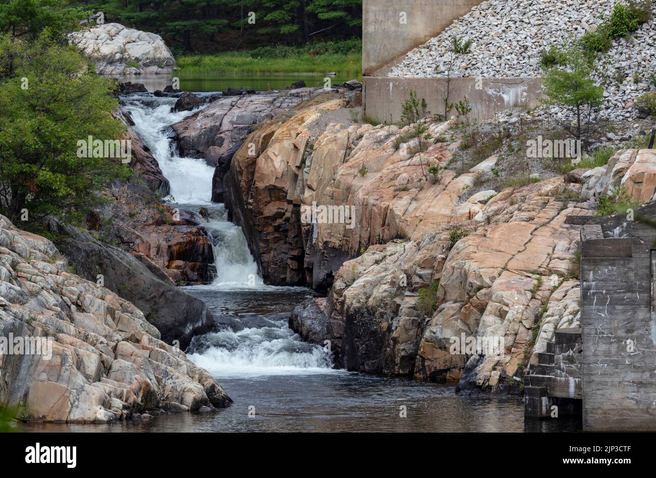 Whitefish Falls, Northern Ontario, slides under a bridge and through a