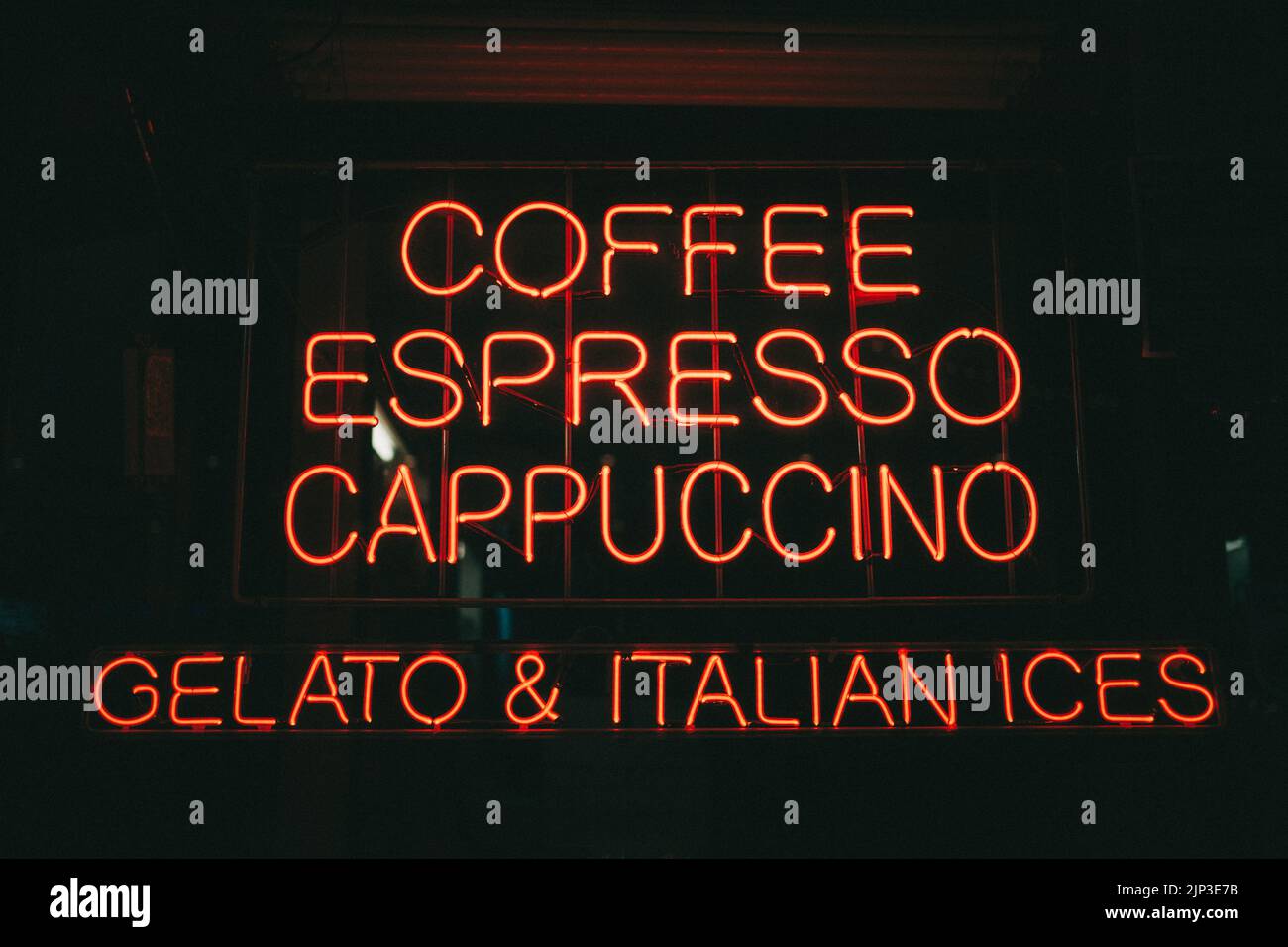 Vintage neon signs at night at La Bella Ferrara, in Little Italy