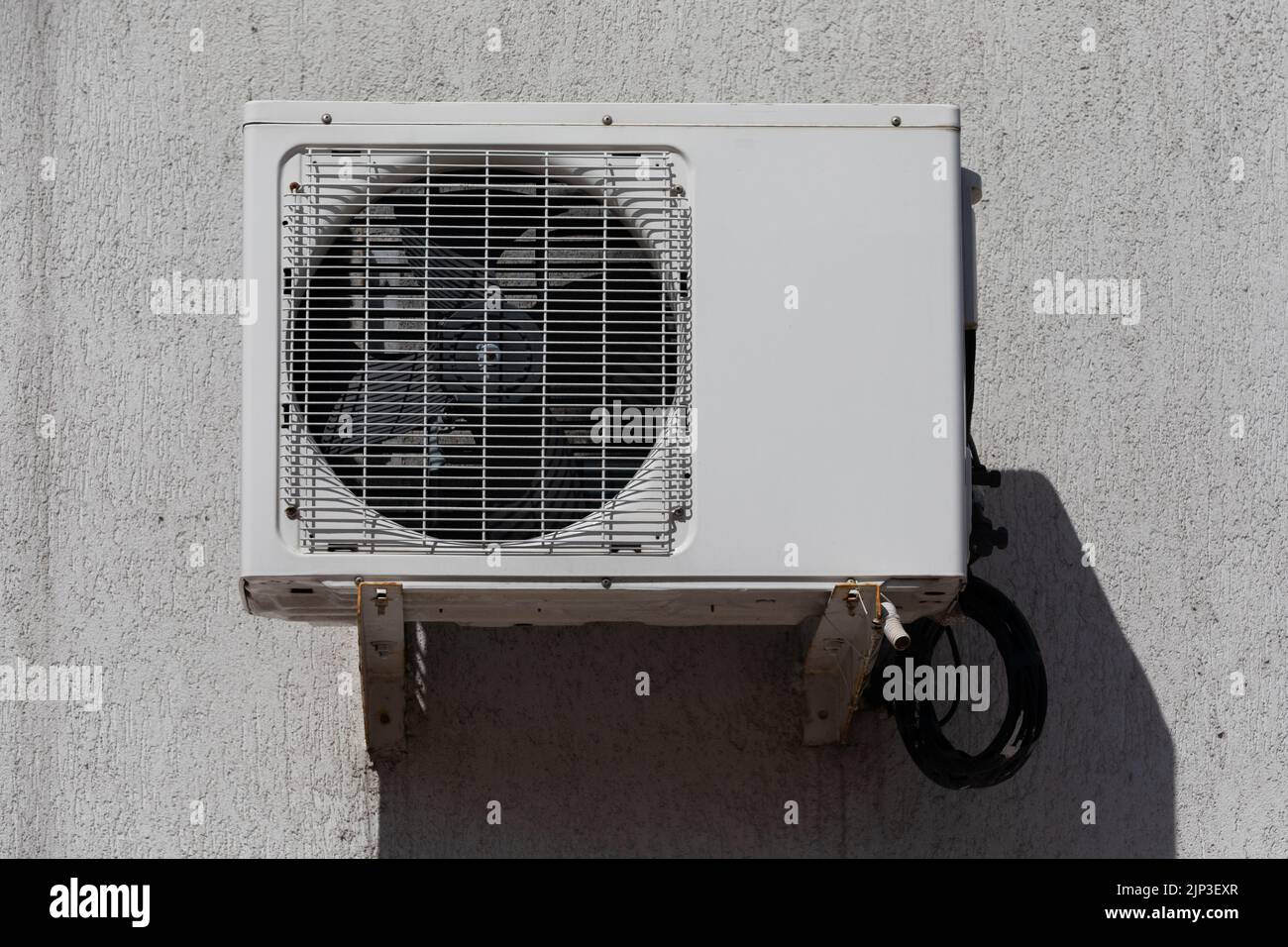 outdoor air conditioner unit on the wall of a building Stock Photo Alamy