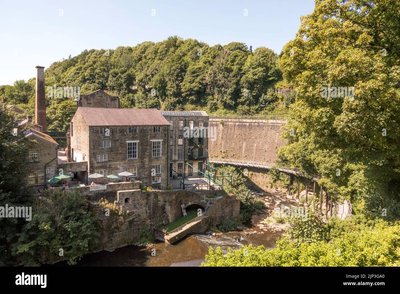The listed Torr Vale Mill in Torrs Gorge of the river Goyt in New Mills, Derbyshire, England, UK Stock Photo