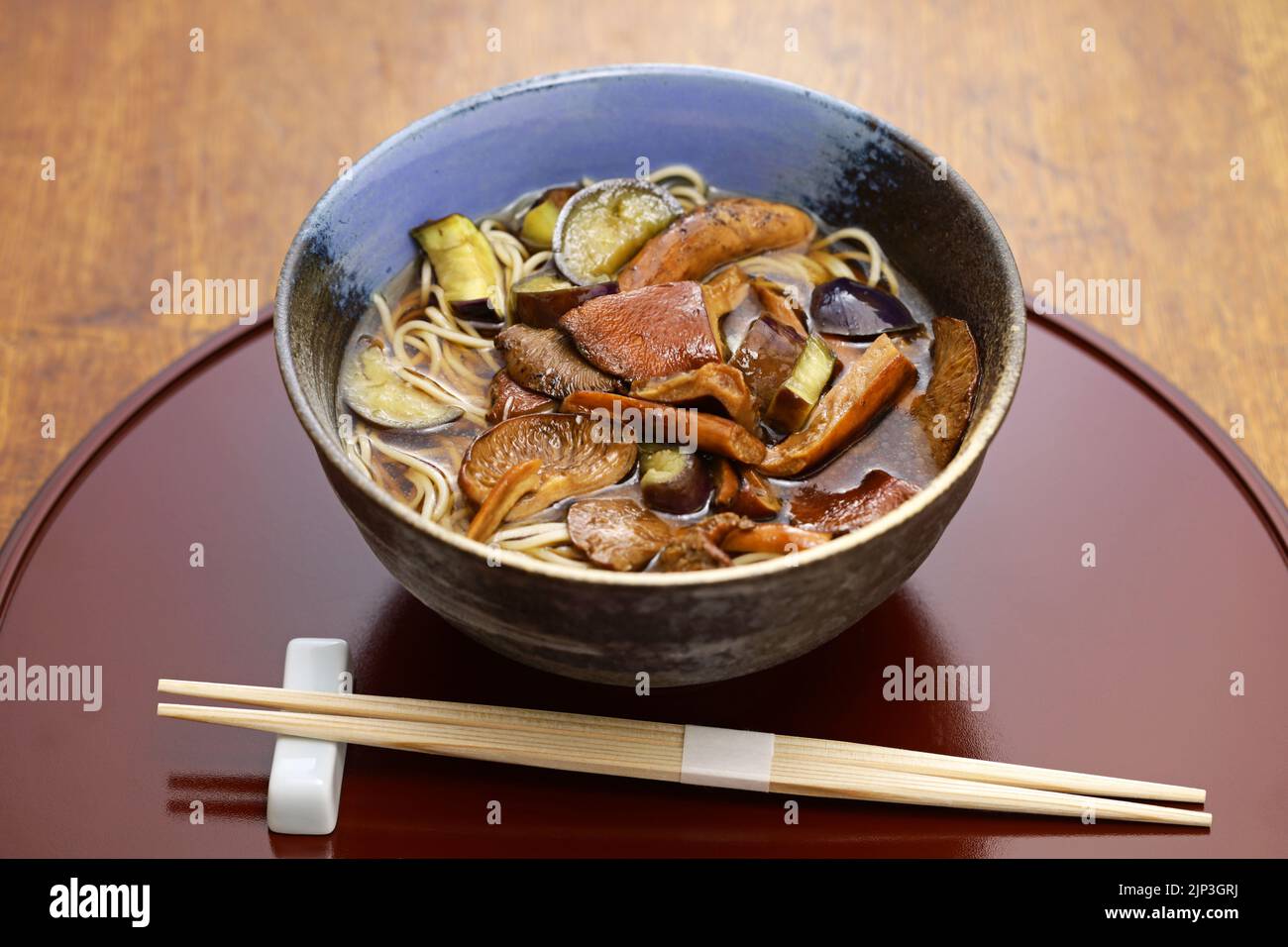 buckwheat noodles with weeping milk cap mushrooms ( Chitake soba ), Japanese noodle dish Stock Photo