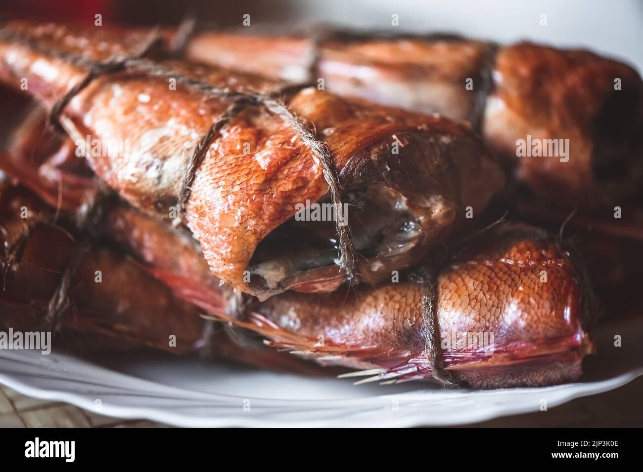 smoked fish sea bass on the table. homemade smoking Stock Photo - Alamy