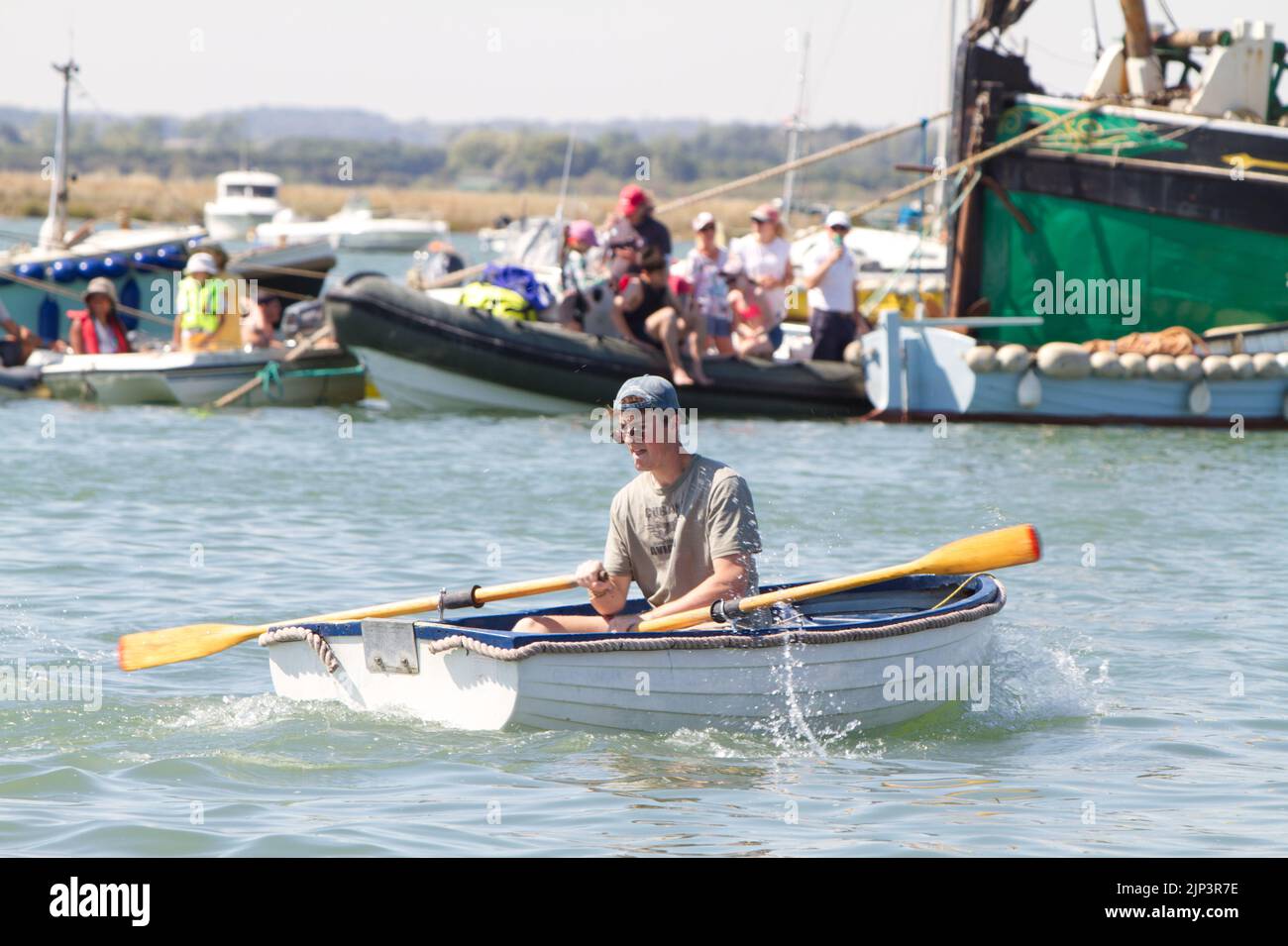 West Mersea Town Regatta on Mersea Island in Essex. One of the rowing races. Stock Photo
