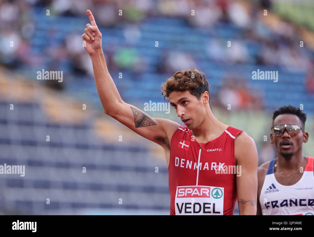 Athletics - 2022 European Championships - Olympiastadion, Munich, Germany - August 15, 2022 Denmark's Benjamin Lobo Vedel celebrates after winning the Men's 400m Round 1 Heat 3 REUTERS/Wolfgang Rattay Stock Photo