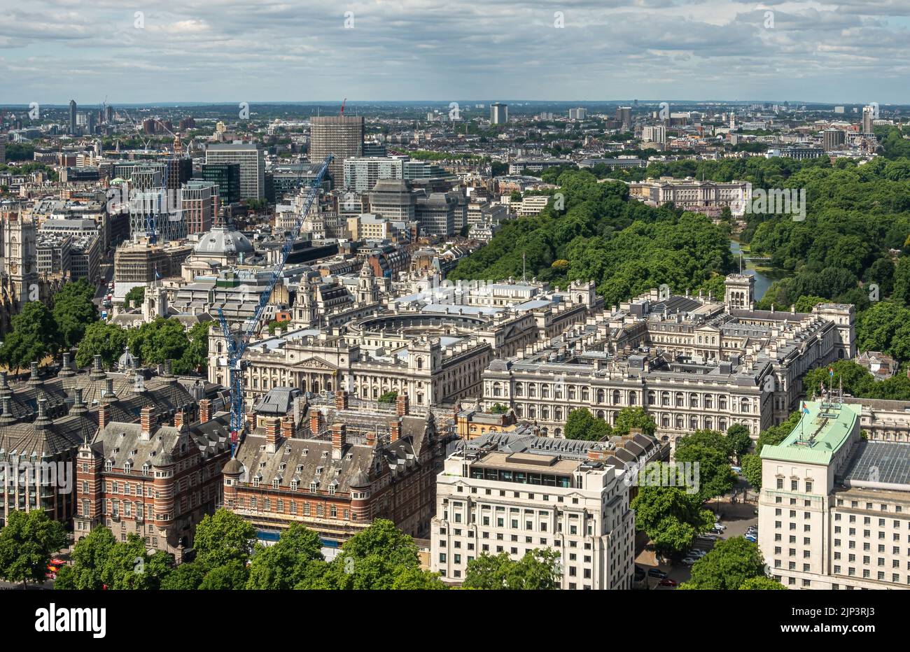 London, UK - July 4, 2022: Seen from London Eye. Imperial War Museum square buildings with green St. James's park behind set in dense urban jungle cit Stock Photo
