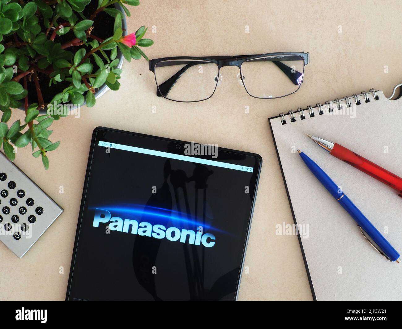In this photo illustration, Panasonic Corporation logo seen displayed on a tablet Stock Photo