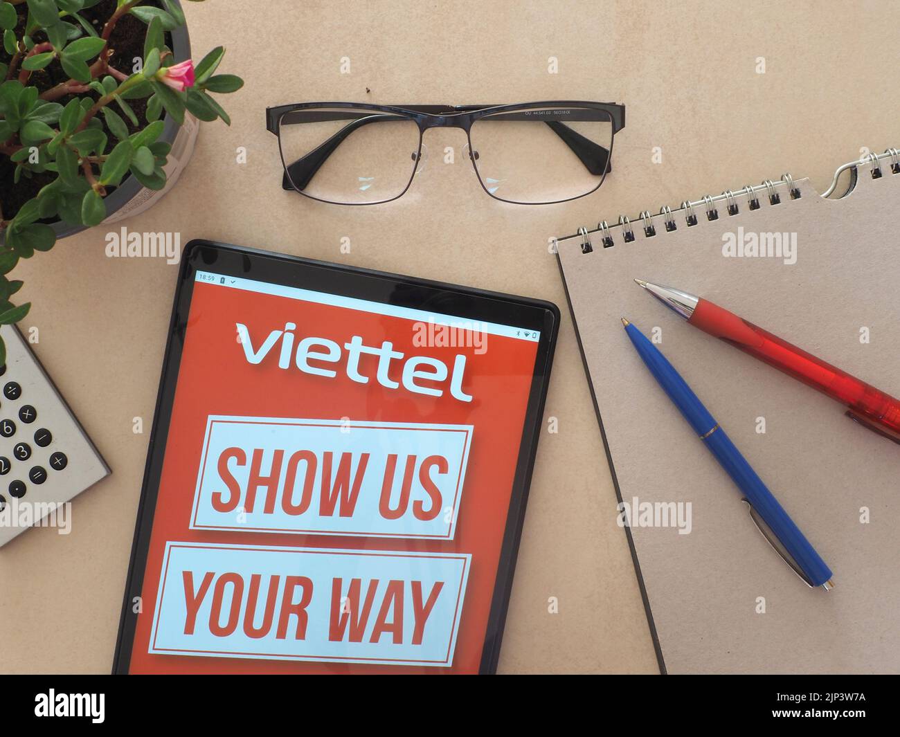 In this photo illustration, Viettel Group logo seen displayed on a tablet Stock Photo
