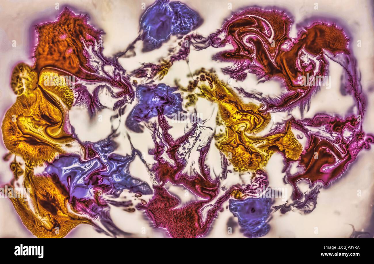 Coloring ink flowing and mixing in milk texture Stock Photo - Alamy