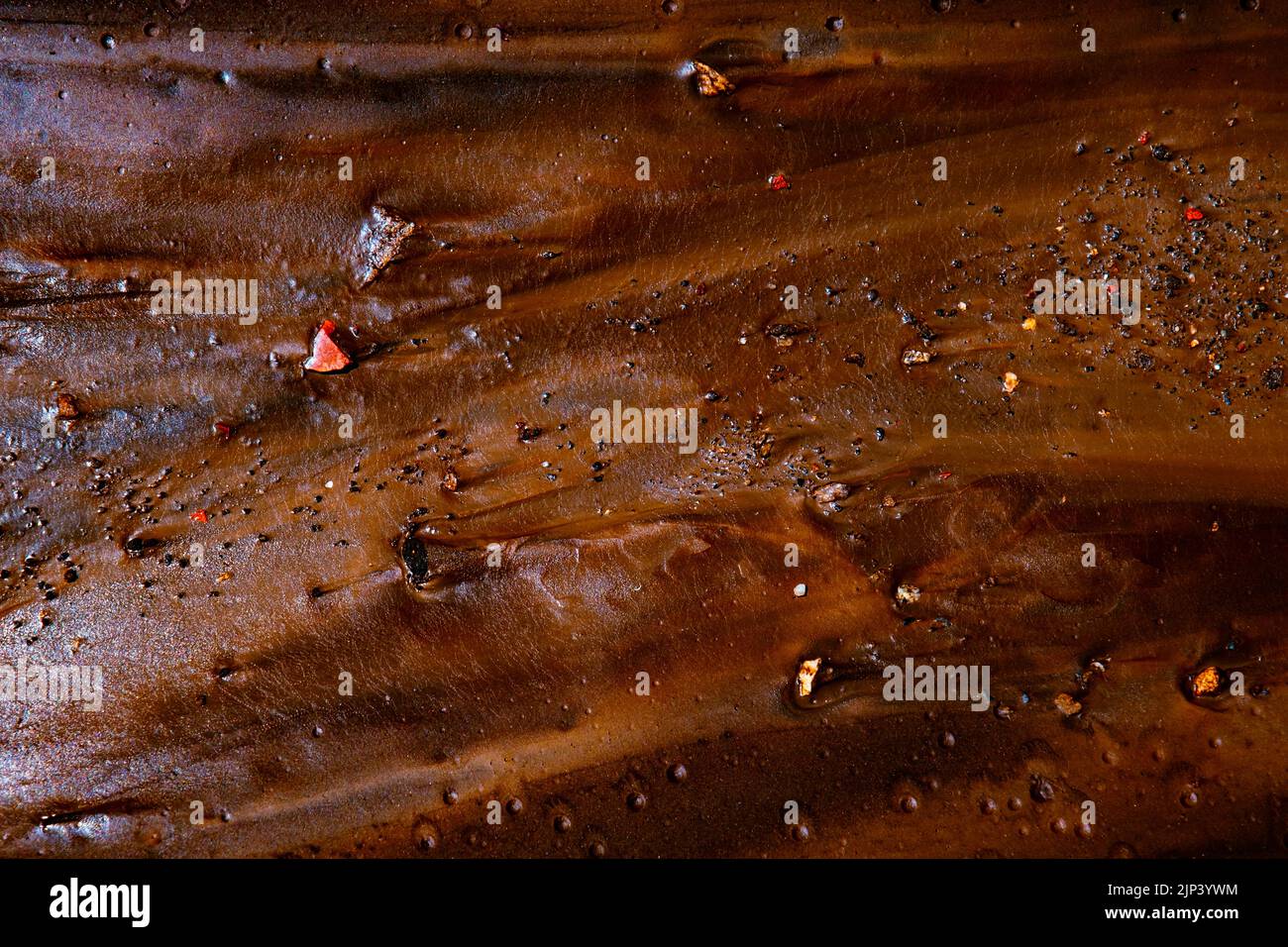 colored mud river, close view Stock Photo - Alamy