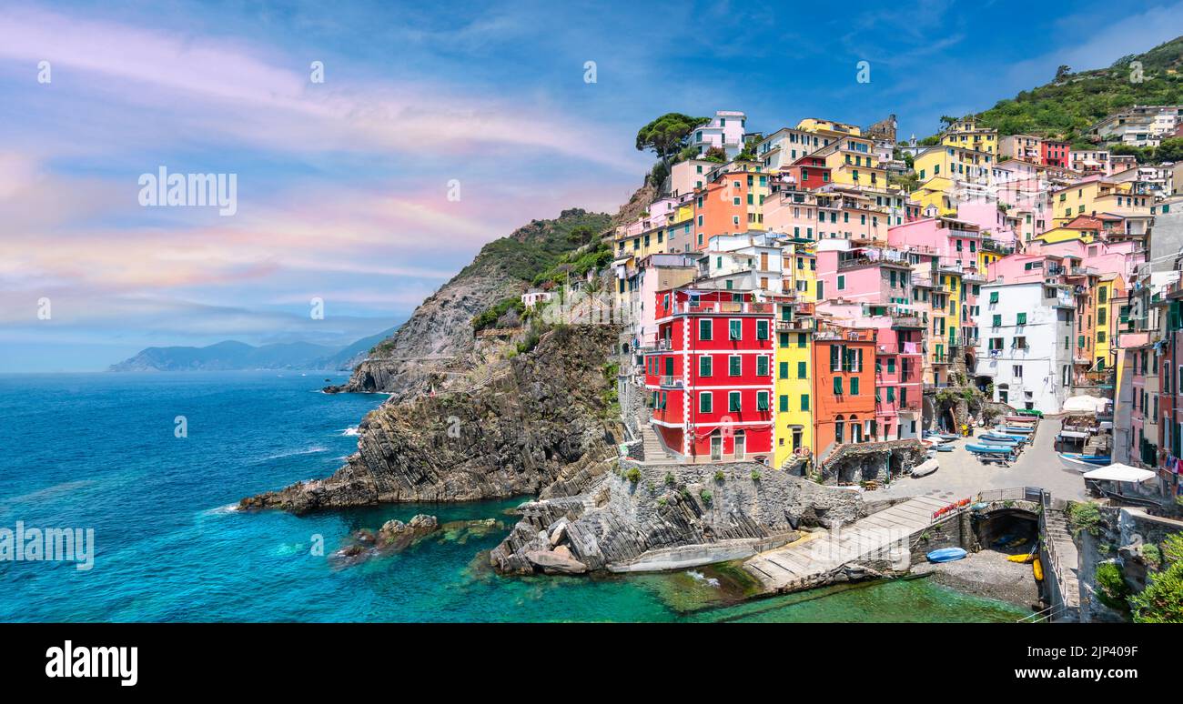 Riomaggiore village along the coastline, Cinque Terre, Italy. Stock Photo
