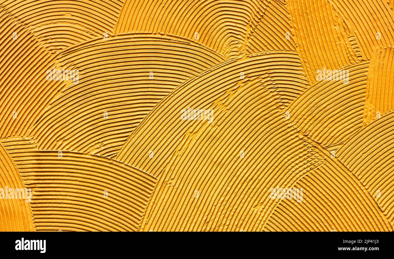 orange decorative relief plaster on wall Stock Photo