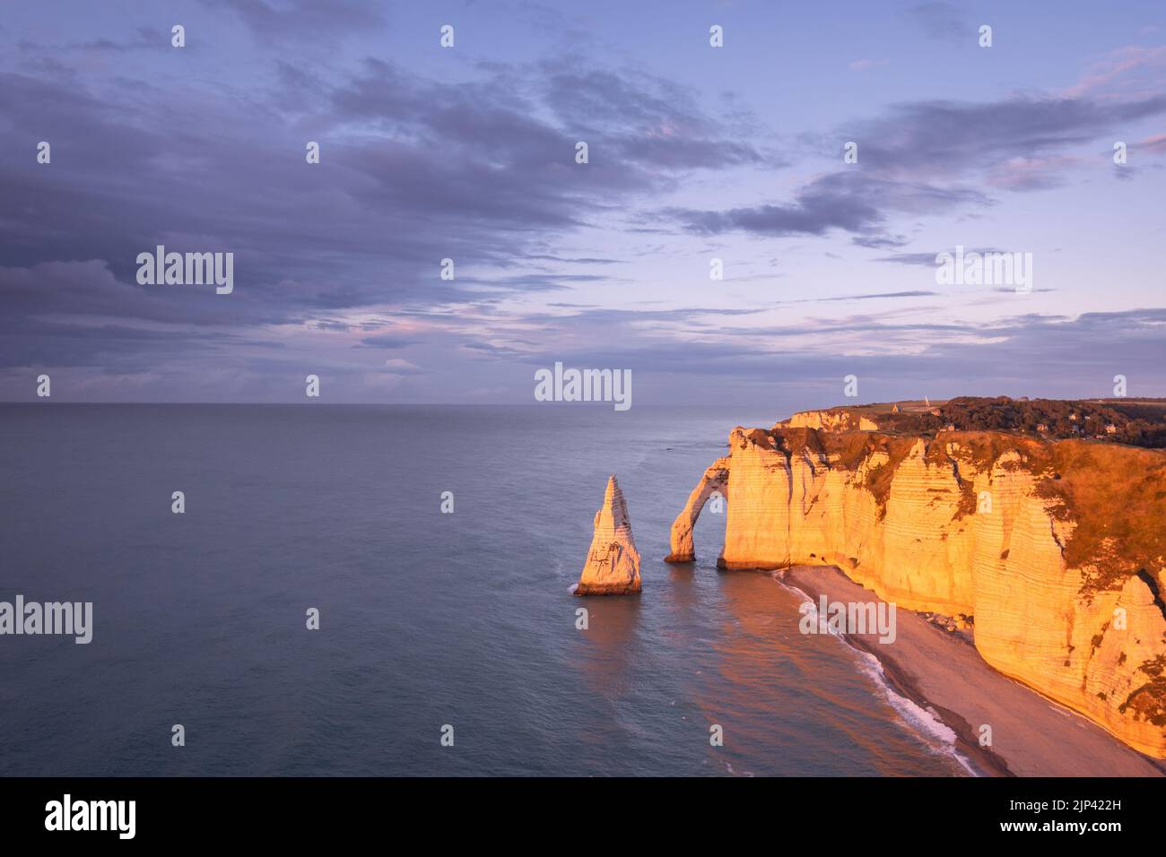 The incredible sunset on the cliffs of Etretat Stock Photo - Alamy