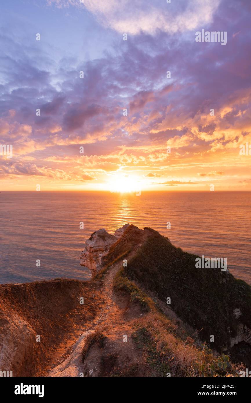 The incredible sunset on the cliffs of Etretat Stock Photo - Alamy
