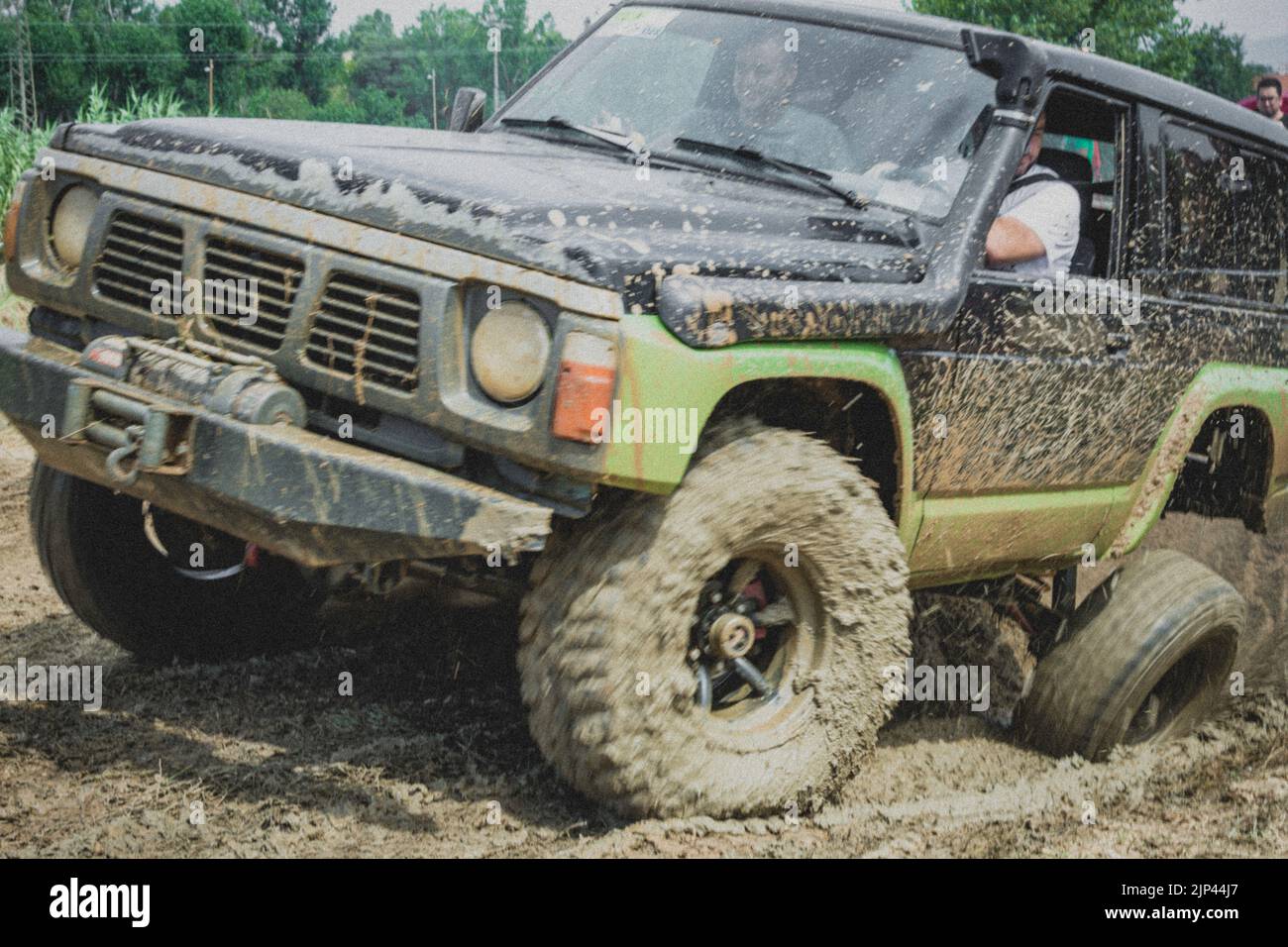 off road Nissan Patrol GR car spinning in the mud Stock Photo Alamy