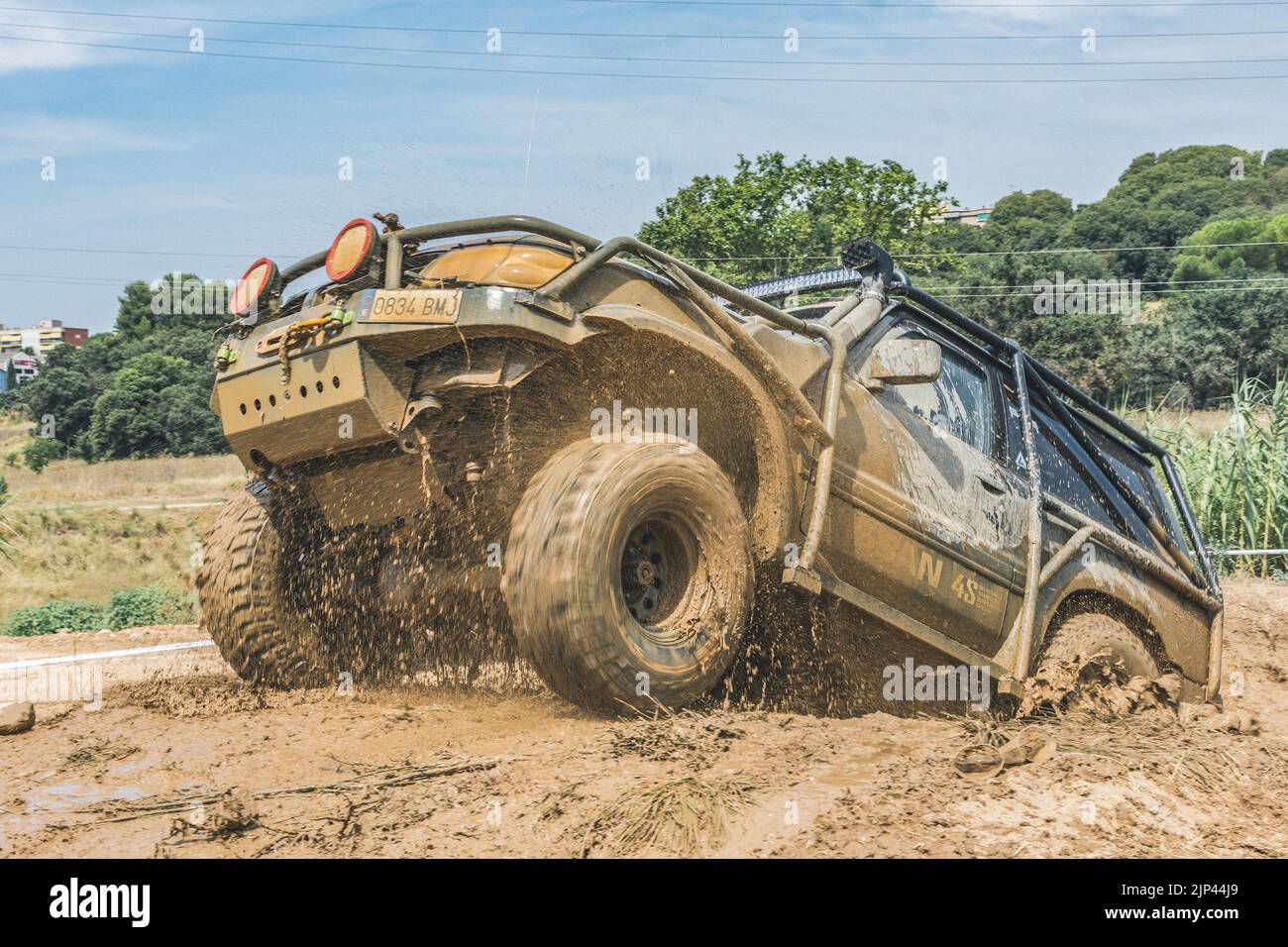 off-road Nissan Patrol GR car spinning in the mud Stock Photo