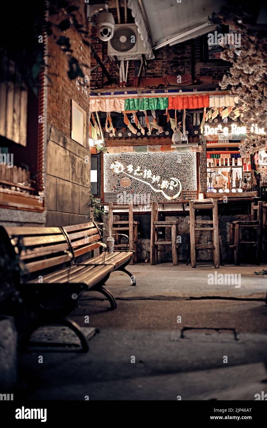 The cornor in Tianzifang: wooden benches Stock Photo