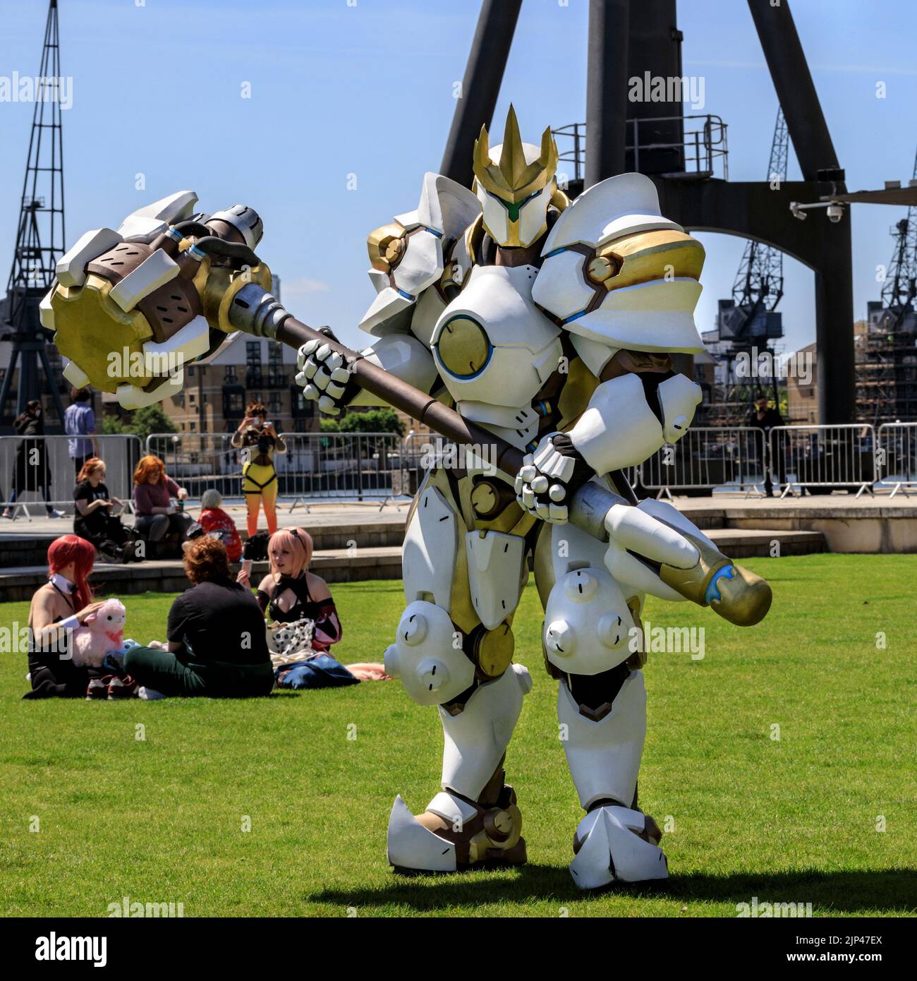Cosplayer posing  Reinhardt from Overwatch in huge costume, London Comic Con Stock Photo