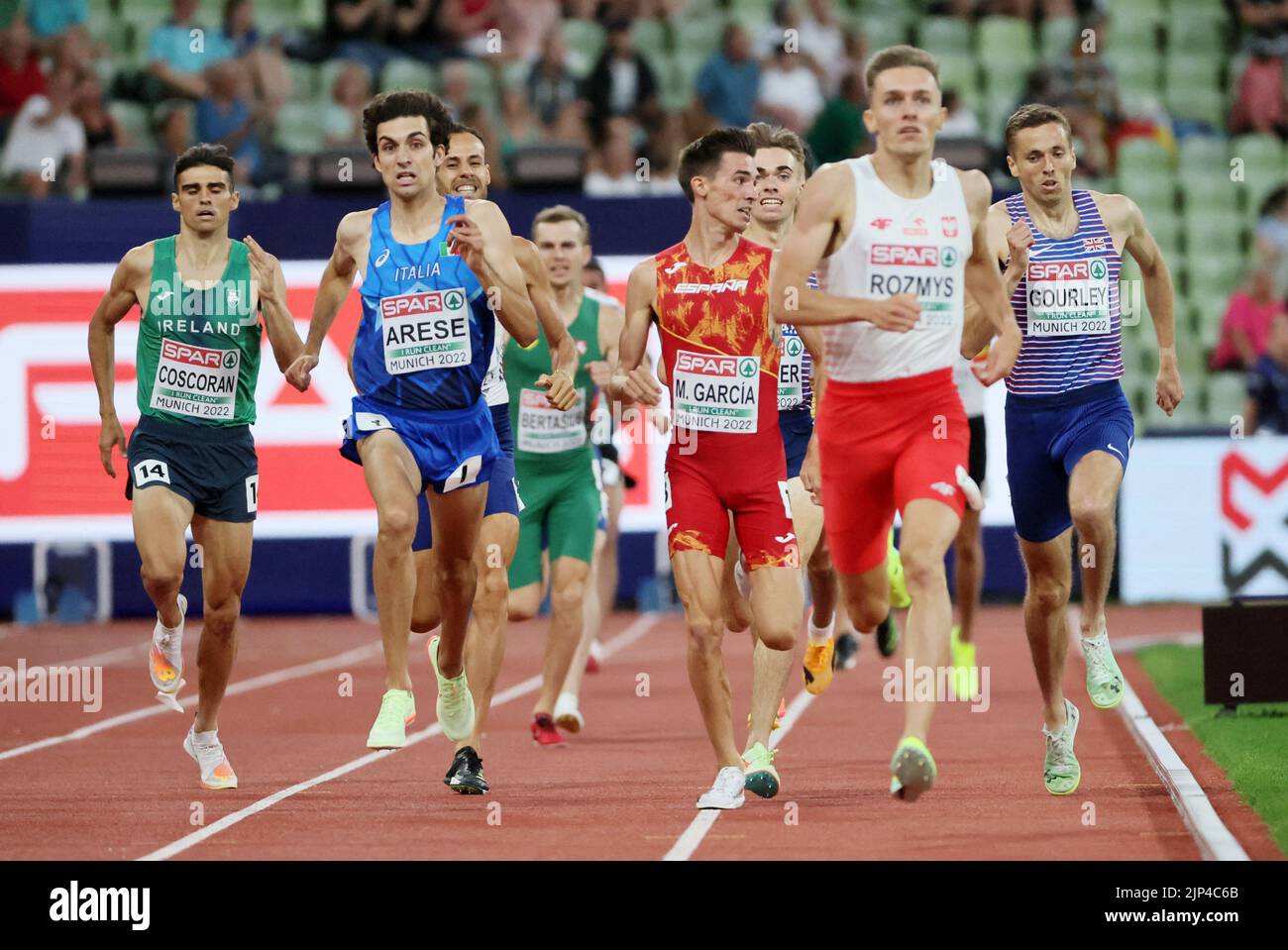 Athletics - 2022 European Championships - Olympiastadion, Munich, Germany - August 15, 2022  Poland's Michal Rozmys, Spain's Mario Garcia, Britain's Neil Gourley and Italy's Pietro Arese in action during men's 1500 metres heat 2 REUTERS/Wolfgang Rattay Stock Photo
