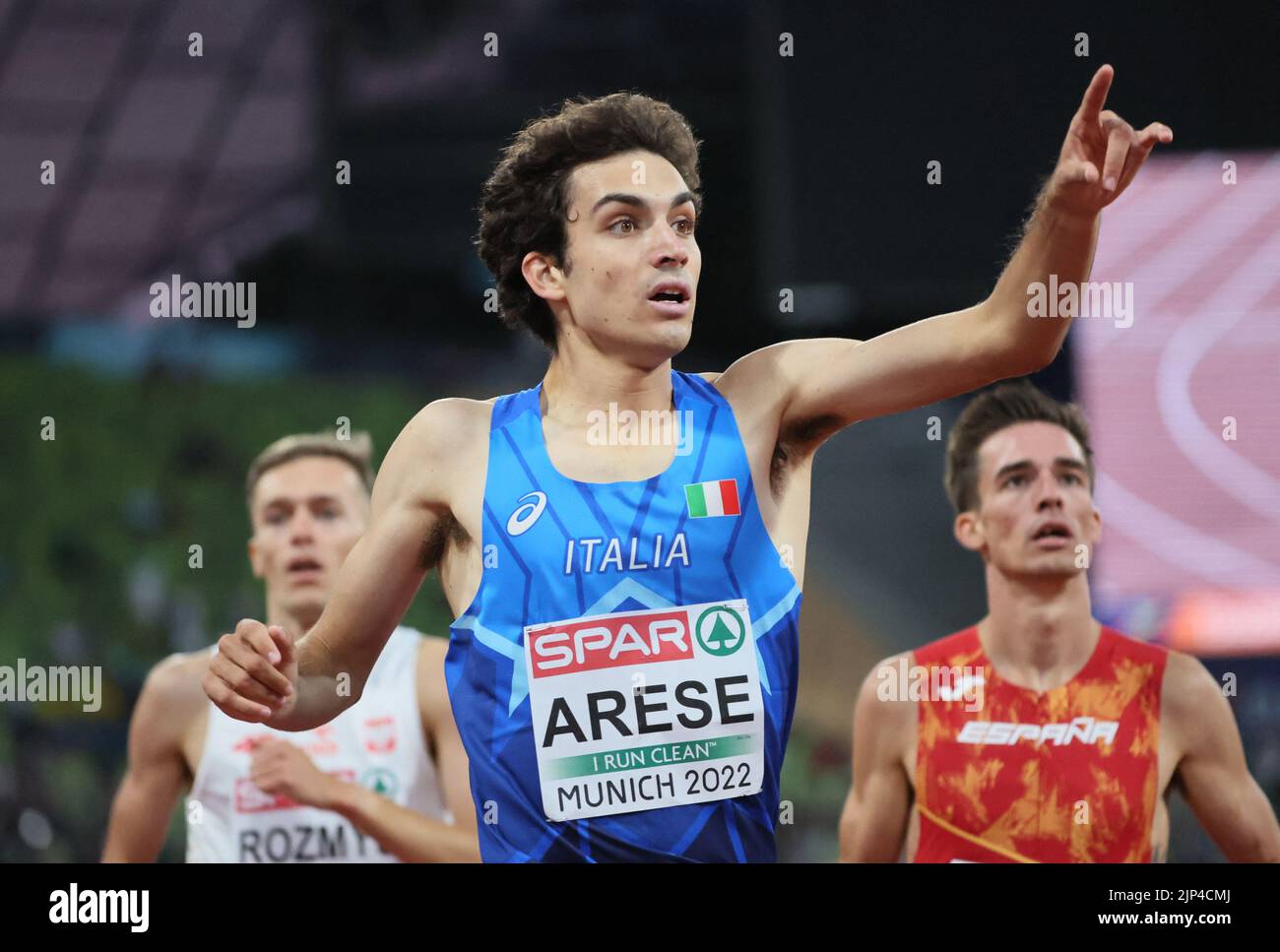 Athletics - 2022 European Championships - Olympiastadion, Munich, Germany - August 15, 2022  Second place Italy's Pietro Arese celebrates after the men's 1500 metres REUTERS/Wolfgang Rattay Stock Photo