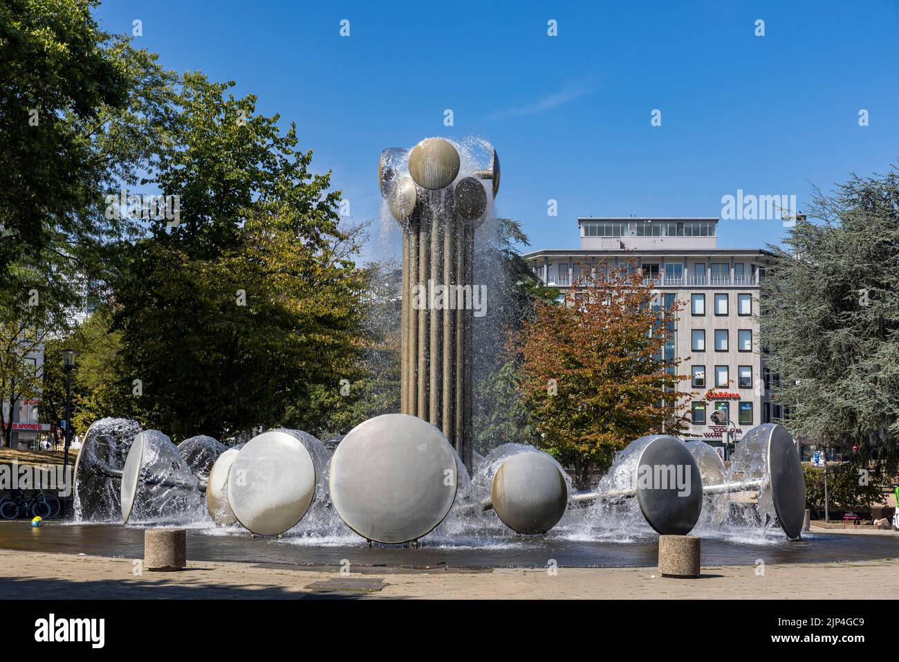 A prominent modern fountain in Cologne on a bright summer day Stock Photo