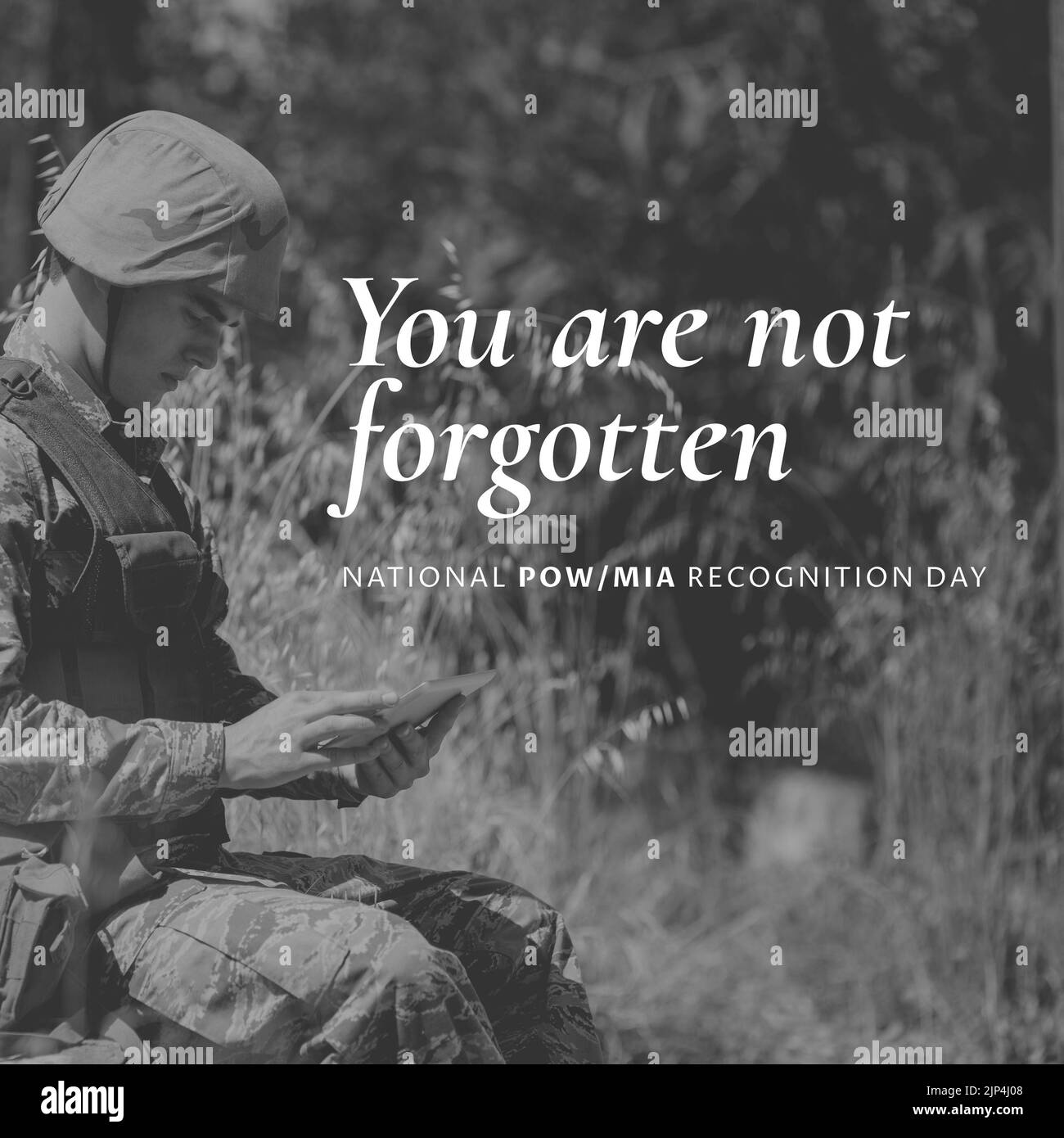 Animation of national pow mia recognition day text over caucasian soldier. National pow mia recognition day and celebration concept digitally generate Stock Photo