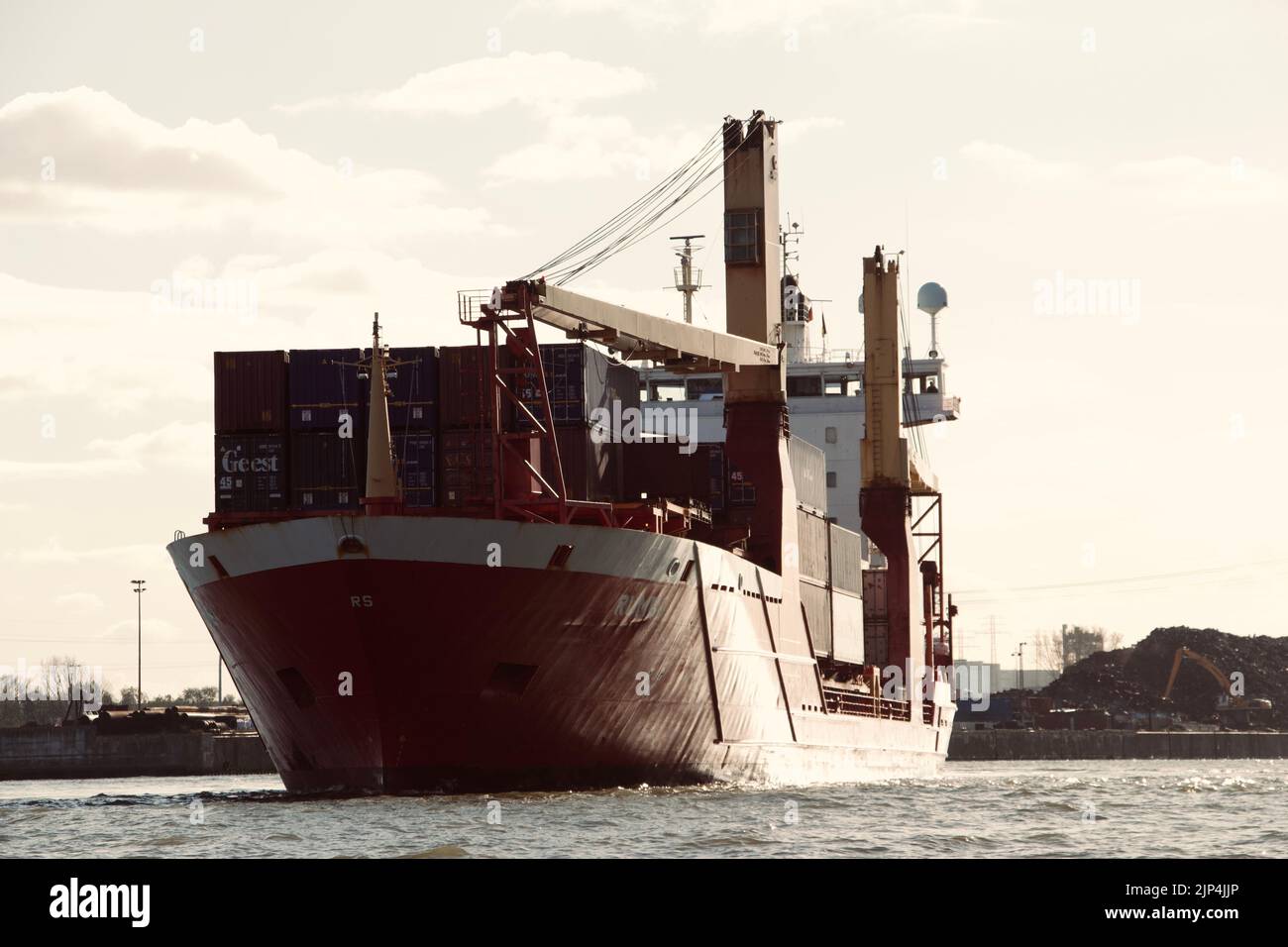 A large container ship leaving the port of Hamburg Stock Photo - Alamy
