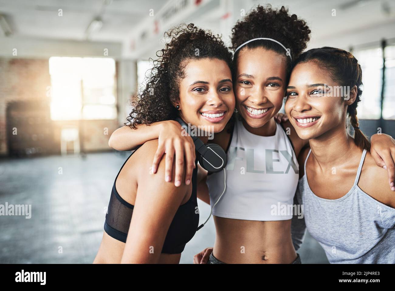 Workouts are so much better done together. a group of happy young women