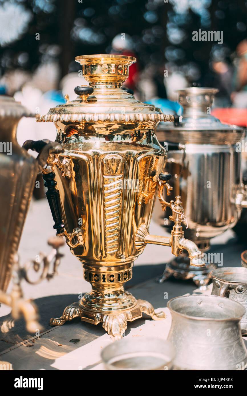 Shiny Bright Traditional Russian Samovar At Flea Market. Tea Party Concept And Hospitality. Vintage Copper Samovar. Since Ancient Times In Russia, All Stock Photo