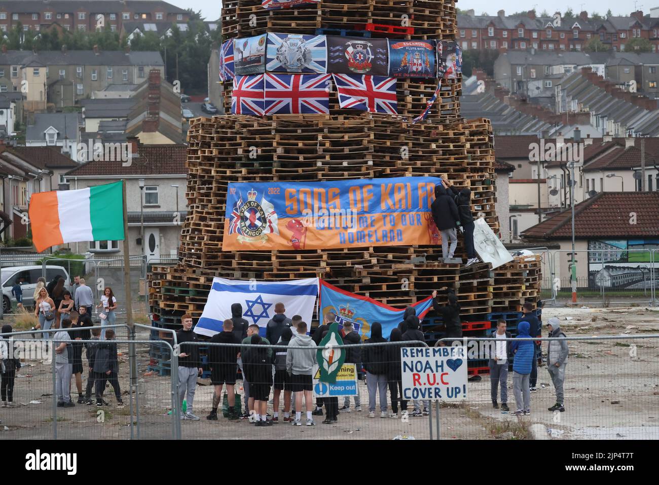 People view a bonfire prior to it being lit to mark the Catholic Feast of the Assumption in the Bogside area of Londonderry, Northern Ireland. Picture date: Monday August 15, 2022. Stock Photo