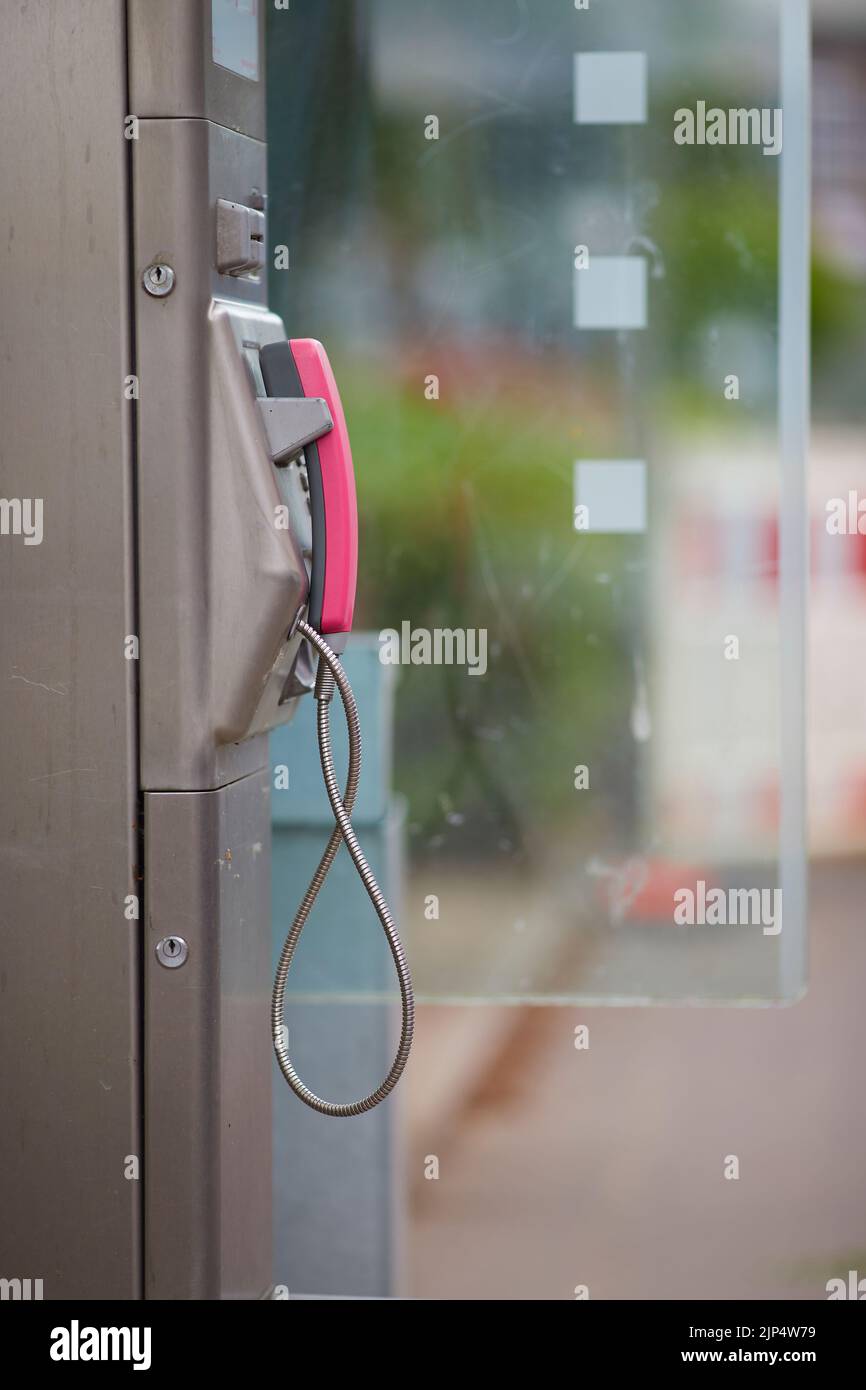 Yellow glass telephone booths with payphones are located on a pedestrian  street. Obsolete means of telephone communication in free access. Bialystok  Stock Photo - Alamy