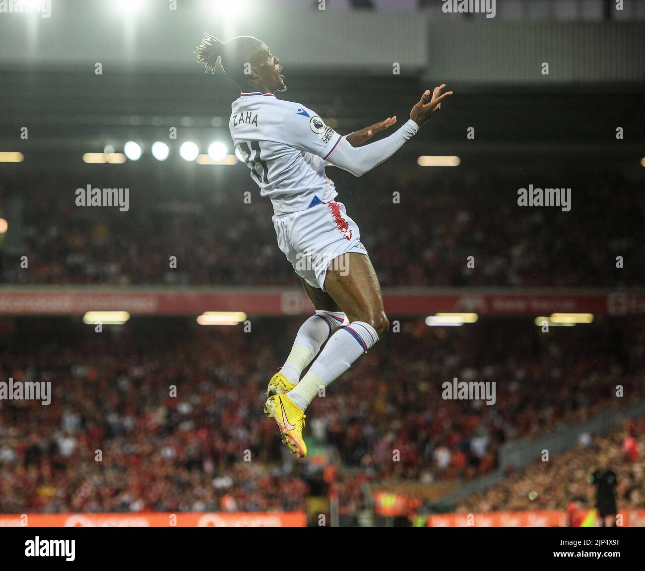 15 Aug 2022 - Liverpool v Crystal Palace - Premier League - Anfield Crystal Palace's Wilfried Zaha celebrates scoring his goal in the first half. Picture : Mark Pain / Alamy Live News Stock Photo