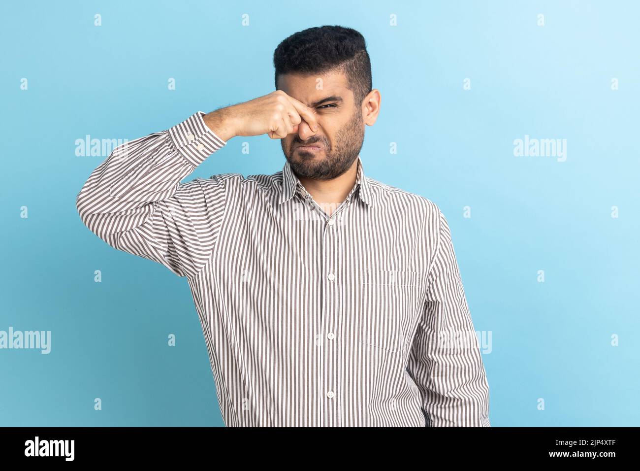 Hand pinching nose hi-res stock photography and images - Alamy