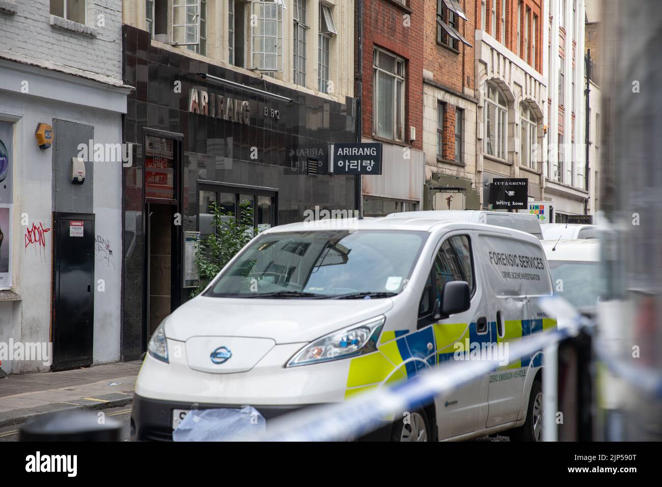 Poland Street, London on 15th August 2022, Forensic services outside Arirang Restaurant as a man was stabbed to death in Poland Street, London on 15th August 2022 Stock Photo