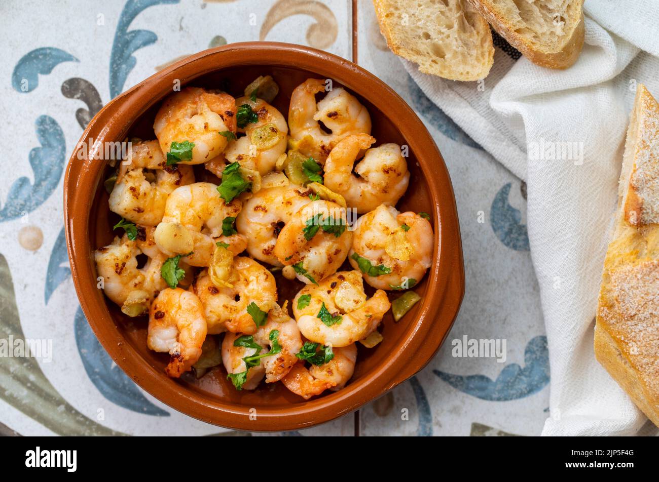Traditional Spanish tapas, prawns with garlic Stock Photo - Alamy