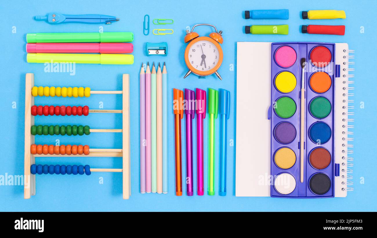 School Color Blue Creative colorful layout of school stationery on pastel blue background ...