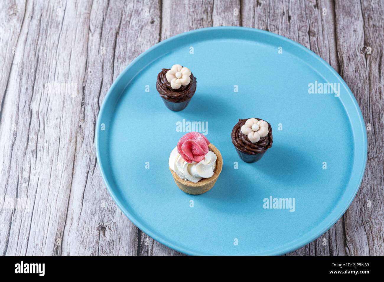 Small sophisticated sweets filled with chocolate ganache and topped