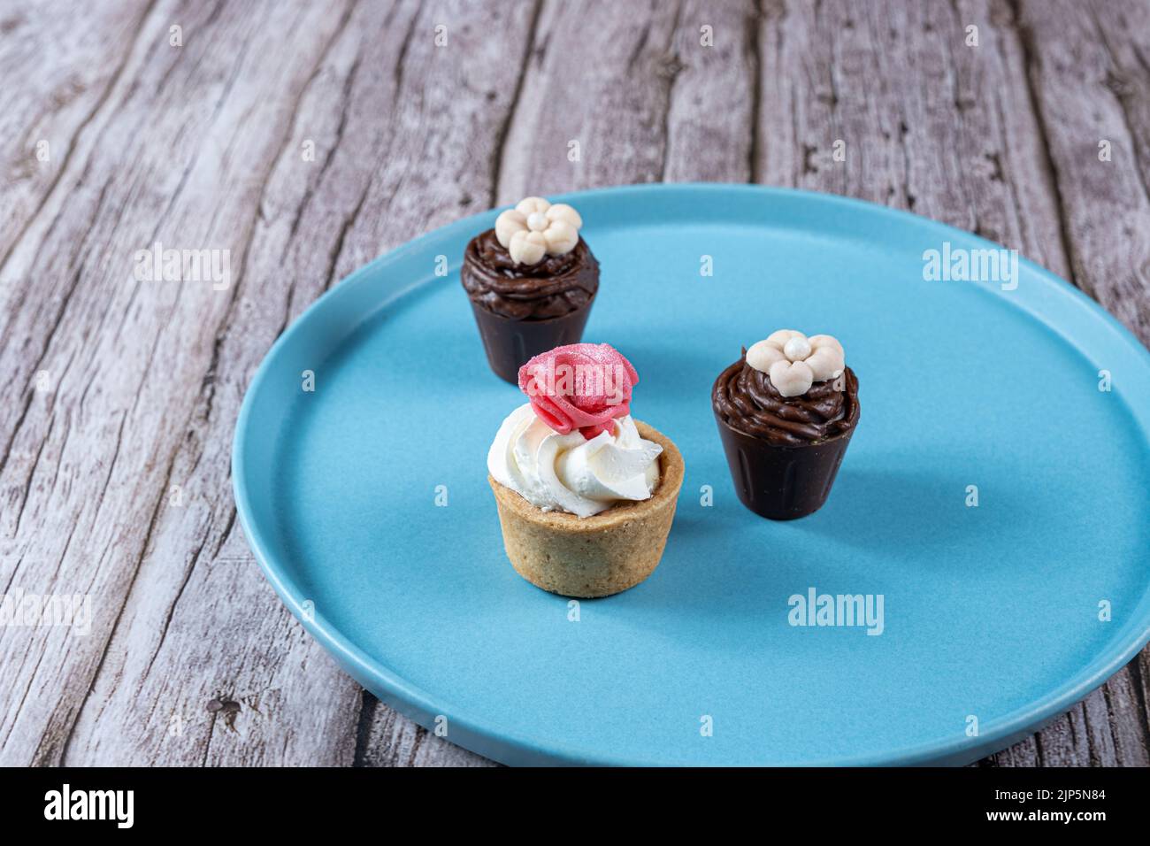 Small sophisticated sweets filled with chocolate ganache and topped