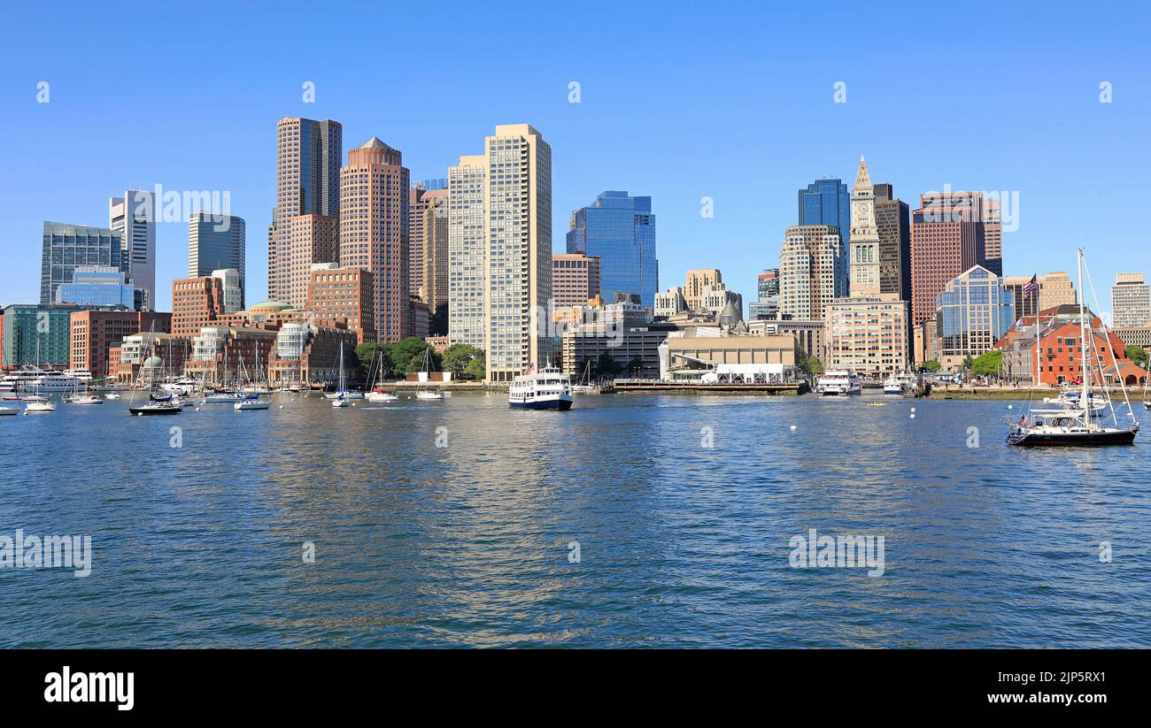 Boston skyline and harbor with boats and Atlantic Ocean on the foreground, USA Stock Photo