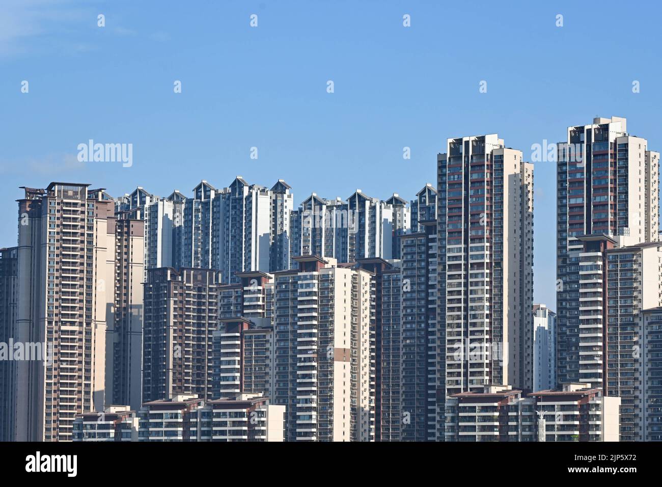 NANNING, CHINA - AUGUST 15, 2022 - A real estate complex under construction is seen in an urban area in Nanning, South China's Guangxi Zhuang autonomo Stock Photo