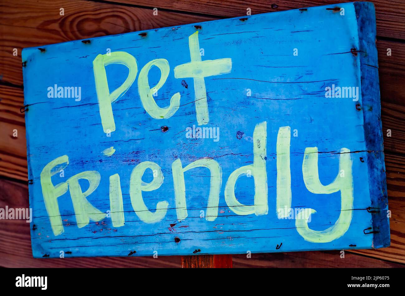 A “pet-friendly” sign is posted outside The Blind Tiger, Aug. 13, 2022, in Bay Saint Louis, Mississippi. Stock Photo
