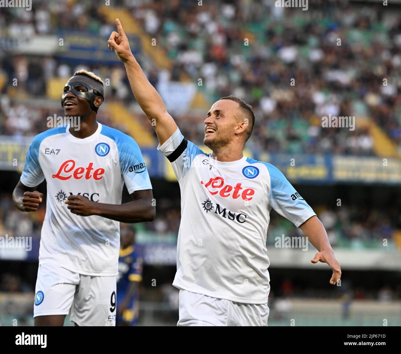 Verona, Italy. 15th Aug, 2022. Napoli's Stanislav Lobotka (R) celebrates  his goal with his teammate Victor Osimhen during a Serie A football match  between Napoli and Hellas Verona in Verona, Italy, on