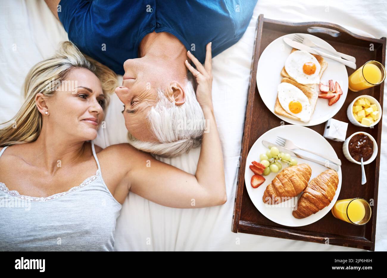 Love Is Filled With The Sweetest Moments An Affectionate Mature Couple Enjoying Breakfast In