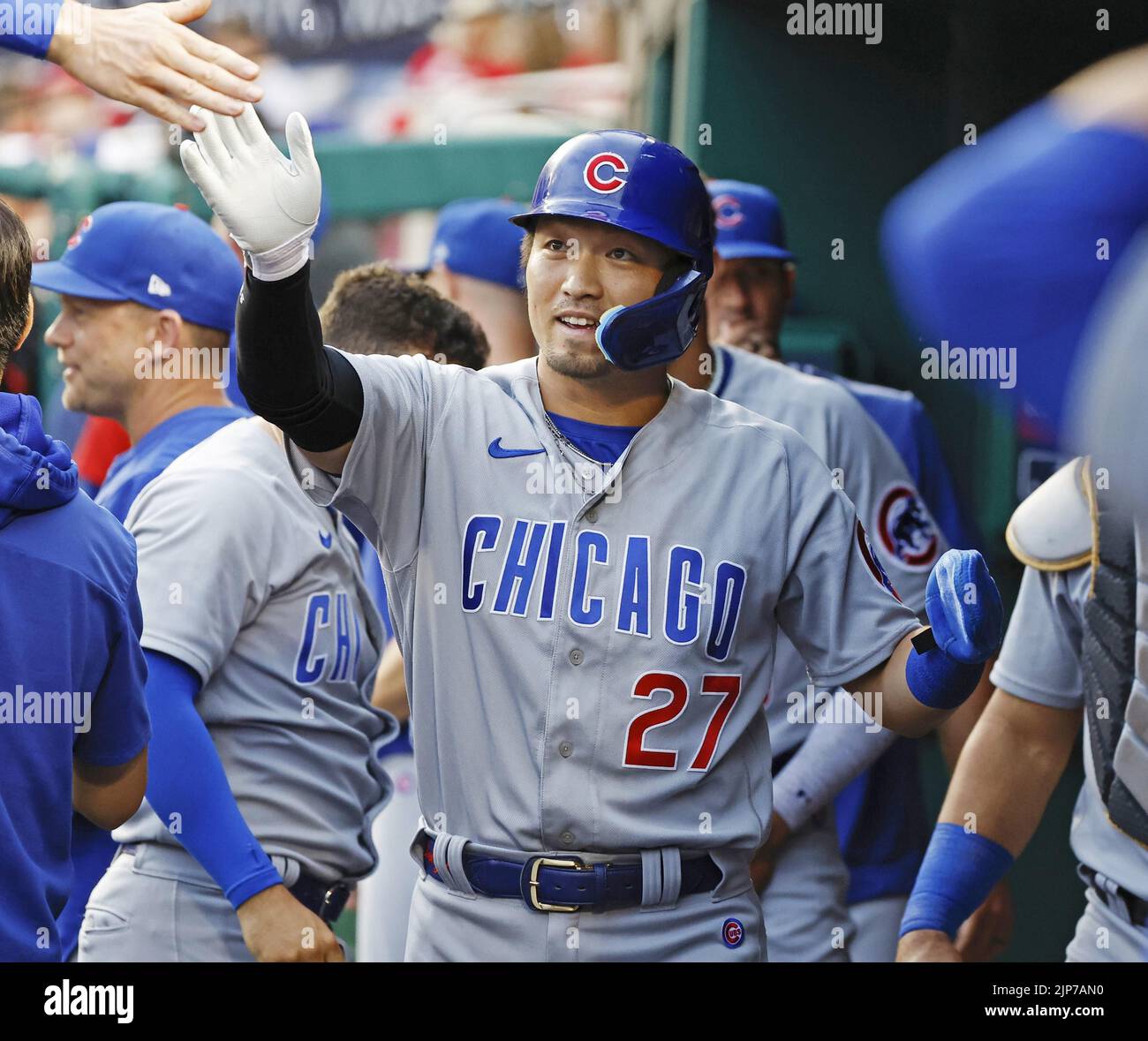 Chicago Cubs' Franmil Reyes laughs as he runs the bases after hitting a  two-run home run during the eighth inning of the team's baseball game  against the Cincinnati Reds in Cincinnati, Wednesday