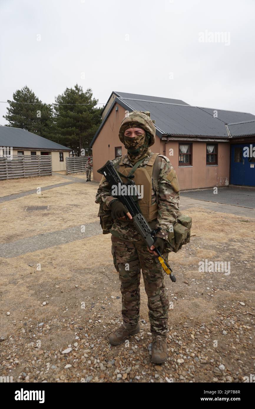 Uk. 15th Aug, 2022. Snejana (34) from Ukraine, a trainer for the Ukrainian military who is also taking part in the training and exchanging ideas with British trainers, stands at a military training ground in southeast England. There, Ukrainians are trained to fight in their home country in a training that lasts several weeks. Credit: Larissa Schwedes/dpa/Alamy Live News Stock Photo