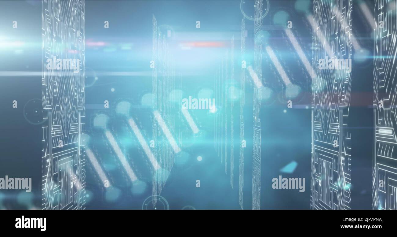 Image of dna structure spinning over screens of microprocessor ...